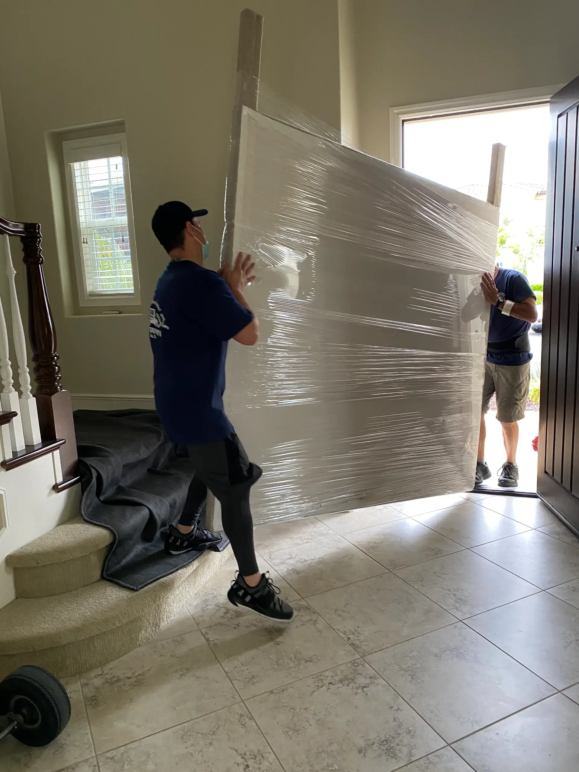 Specialty moving of a piano and antiques